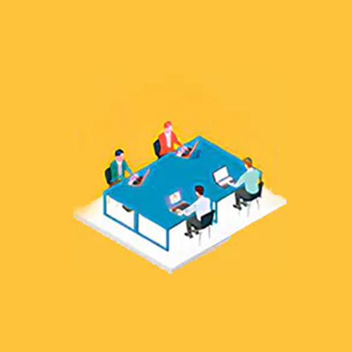 Four people are seated around a blue table, each working on a laptop against a yellow background, showcasing an ideal setup for our office suites for rent.
