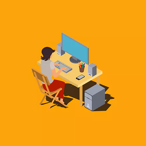 Person sitting at a desk with a computer, keyboard, mouse, and stationery on an orange background, showcasing the perfect setup found in our office suites for rent.